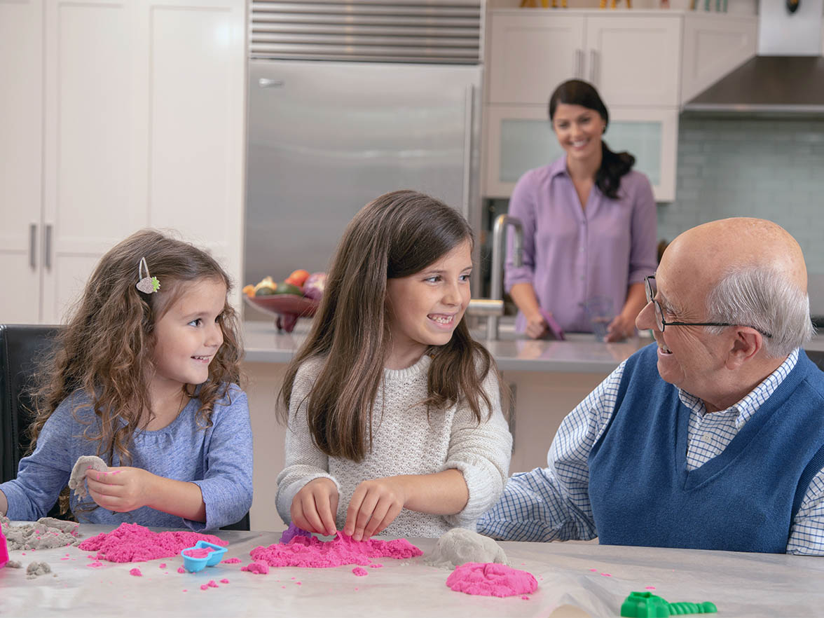 Family playing together inside