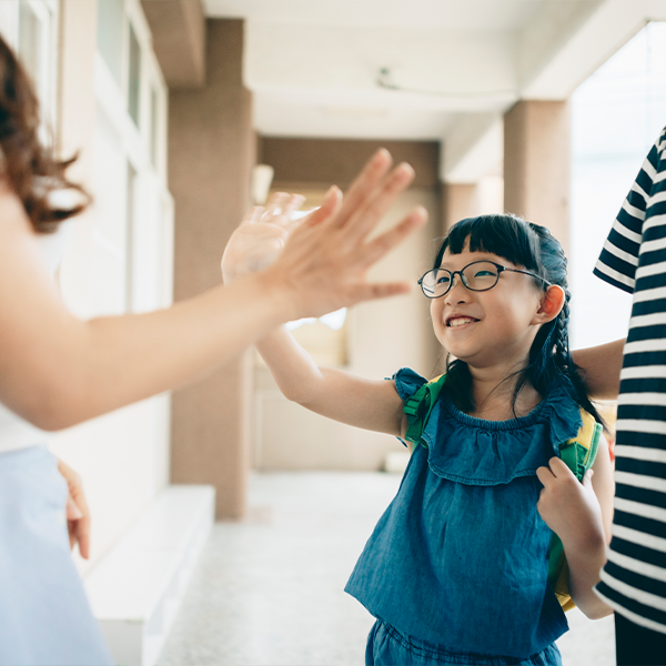 Child giving high-five