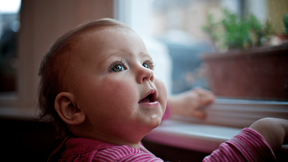 Child looking up at camera