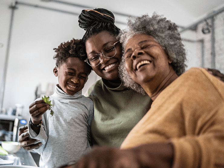 Family of three hugging