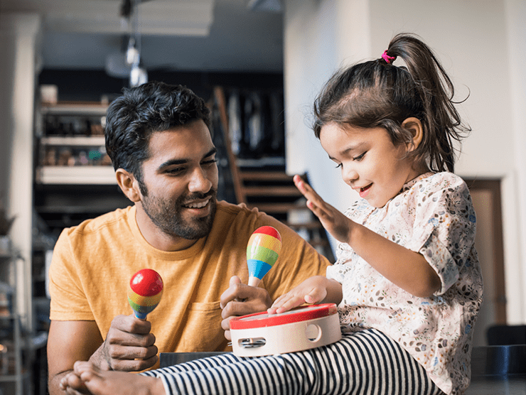 Father and daughter playing