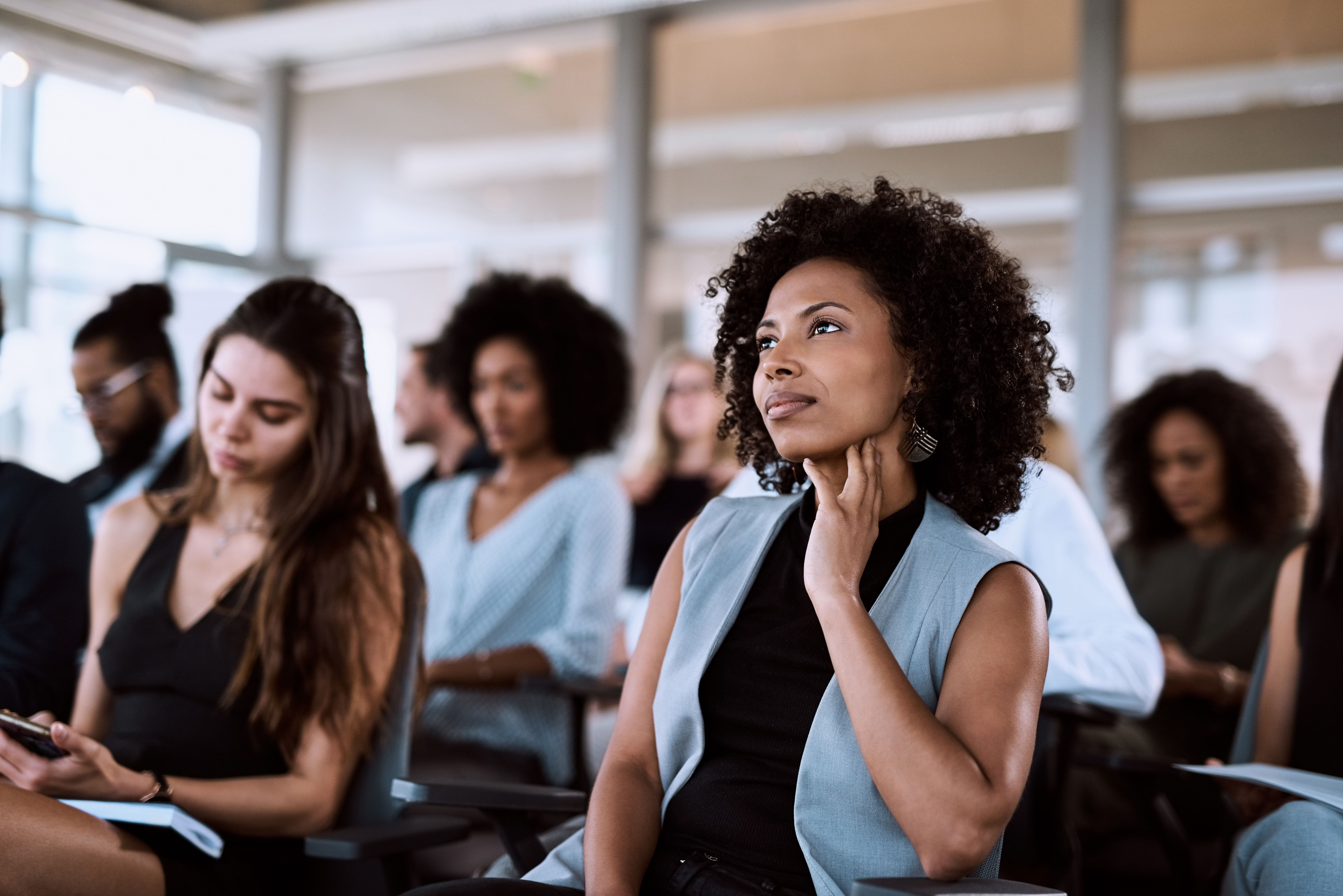 woman listening to lecture