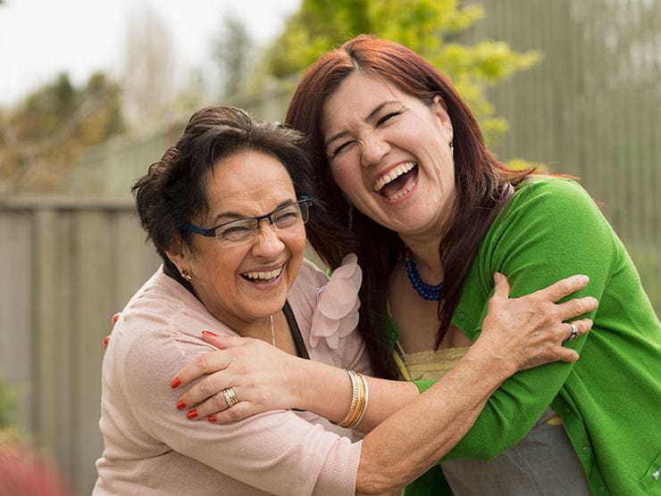 Two women hugging