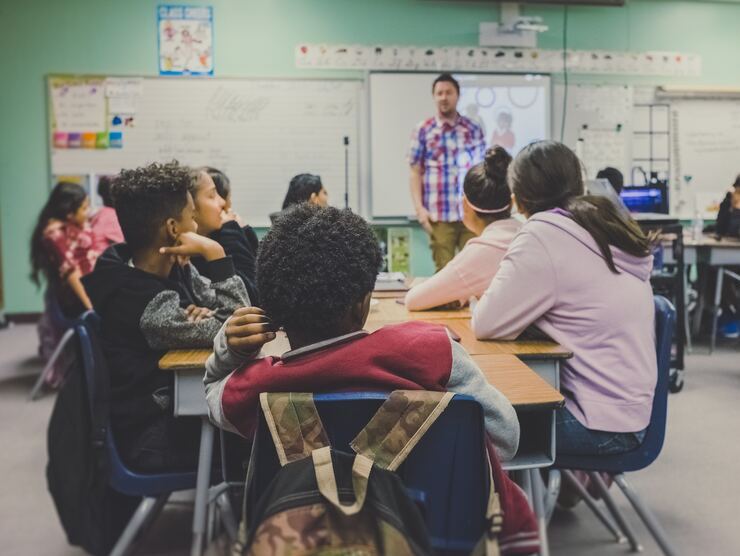 Teacher and students in a classroom